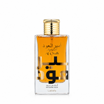 A rectangular glass bottle of Al Oudh Intense Oud perfume by Lattafa, filled with amber-colored liquid and featuring a gold cap, set against a plain white background.