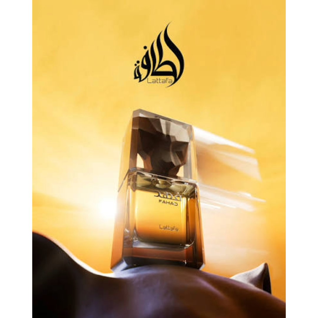 A bottle of Lattafa Fahad perfume with a faceted clear cap and amber-colored liquid, set against a warm golden-yellow background with the Lattafa logo above.